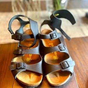 Birkenstock.  Gladiator sandals.